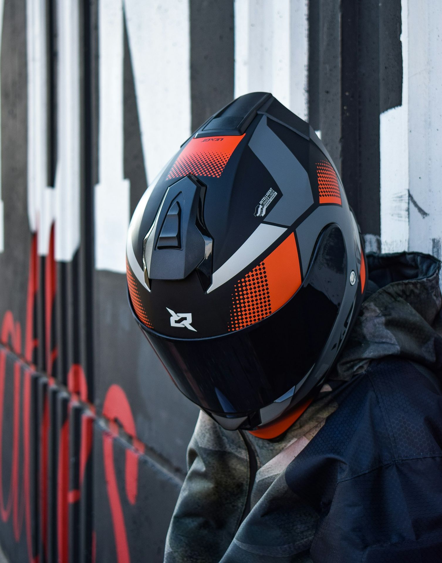 a person wearing a helmet and a jacket